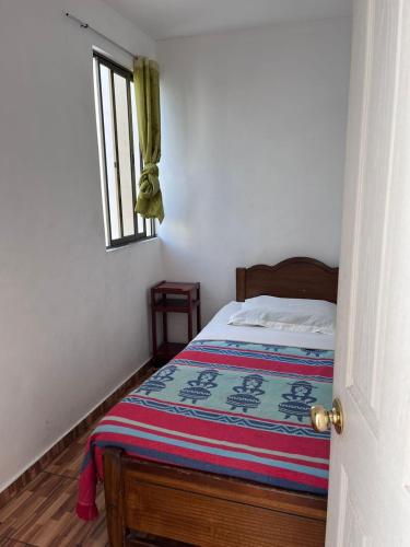 Giường trong phòng chung tại Las tres cruces