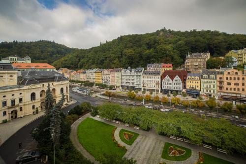 a view of a city with buildings and a street at Interhotel Central in Karlovy Vary