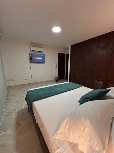 Ένα ή περισσότερα κρεβάτια σε δωμάτιο στο Hotel Ingenio NJ