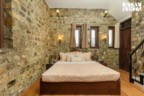 Cama o camas de una habitación en The Enchanted Forest with ATV Bike, Pet Friendly at Jim Corbett by StayVista
