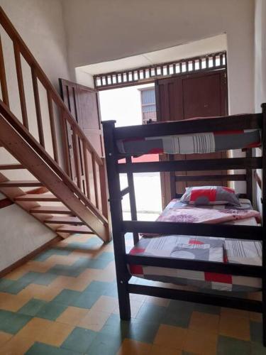 Katil atau katil-katil dalam bilik di Apartaestudio cerca a parque Zapatoca