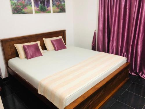 Postel nebo postele na pokoji v ubytování Mango House River Inn Negombo