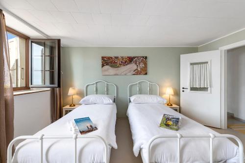 Postel nebo postele na pokoji v ubytování Casa Matilde Apartments