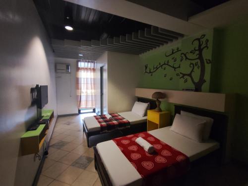 Balai Subik Hotelにあるベッド
