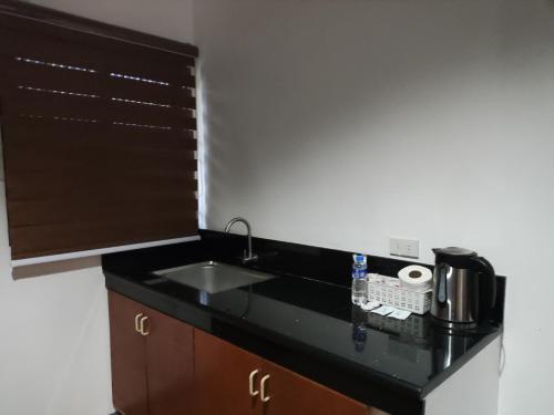 Kuchyň nebo kuchyňský kout v ubytování Balai Subik Hotel