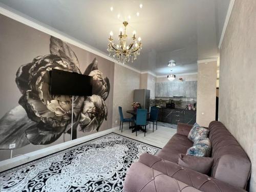 Posezení v ubytování С видом на горы апартаменты с дизайнерским ремонтом