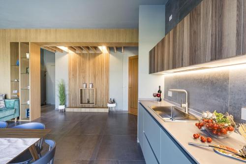 a kitchen with a sink and a counter at Villa Bizzarria in Castellammare del Golfo