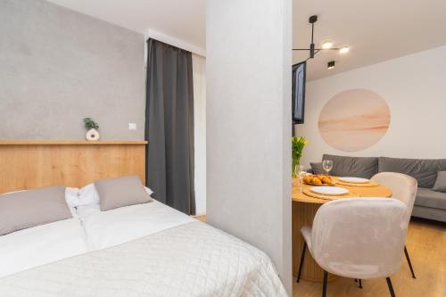 Katil atau katil-katil dalam bilik di Apartamenty Mierzeja NCNK Stegna Park II - 500m od plaży
