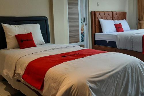 Katil atau katil-katil dalam bilik di RedDoorz At Hotel Pakem Sari Kaliurang
