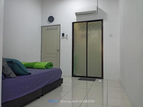 Fotografie z fotogalerie ubytování Nur’s Homestay v destinaci Kuala Kelawang