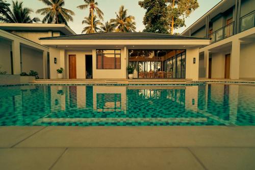 Bazén v ubytování Cocotree Resort nebo v jeho okolí