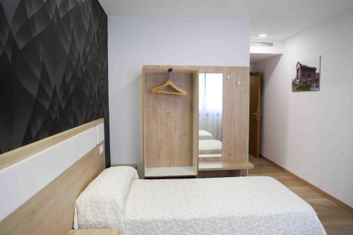 Postel nebo postele na pokoji v ubytování A Quinta de Cea