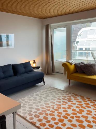 Posezení v ubytování Apartment mit Meeresblick Wangerooge
