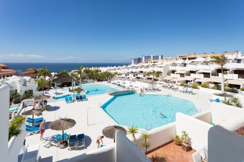 an aerial view of a resort with a swimming pool at Paradise Homes Tenerife in Playa Paraiso