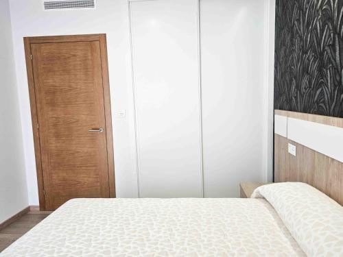 Postel nebo postele na pokoji v ubytování A Quinta de Cea - Apartamentos