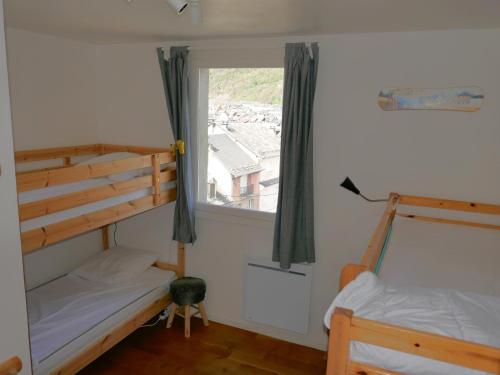 Кровать или кровати в номере Appartement hypercentre 6 pers