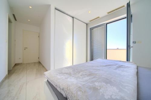 Ένα ή περισσότερα κρεβάτια σε δωμάτιο στο Villa Sia
