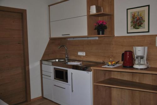 das Luggi Appartementsにあるキッチンまたは簡易キッチン
