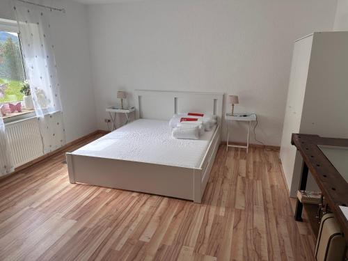 Postel nebo postele na pokoji v ubytování Ferienwohnung Hinzweiler