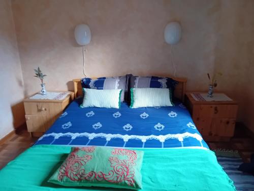 Postel nebo postele na pokoji v ubytování appartement spacieux dans joli village alsacien
