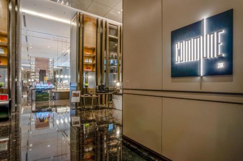a store lobby with a sign that reads future at InterContinental Xi'an Hi-Tech Zone in Xi'an