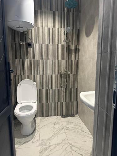 Ein Badezimmer in der Unterkunft EVN Rooms