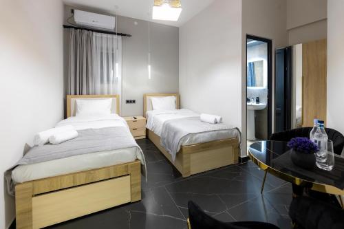 Postel nebo postele na pokoji v ubytování EVN Rooms