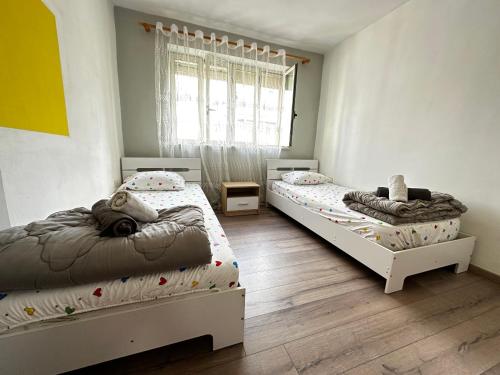 Ένα ή περισσότερα κρεβάτια σε δωμάτιο στο Bob Marley Apartment