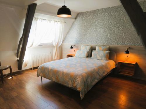 Postel nebo postele na pokoji v ubytování Le Gîte du Coin - Maison de vacances avec jardin