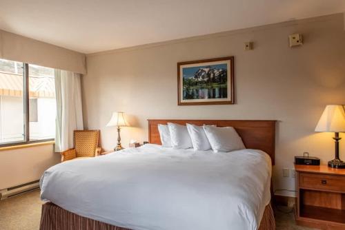 Postel nebo postele na pokoji v ubytování 1bd SUITE 504 Perfect Location with Pool and Hot Tub