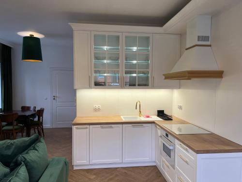 Η κουζίνα ή μικρή κουζίνα στο Apartamenty pod Dębami