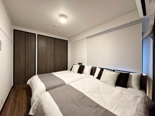 Postel nebo postele na pokoji v ubytování Earls Court - Apt for 14 Ppl Great Location In a Quiet Area