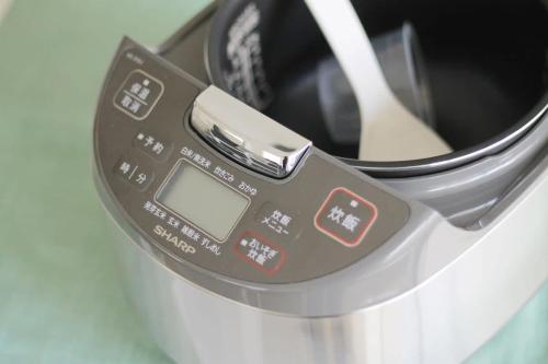 a close up of a washing machine with a meter at bHOTEL Arts Dobashi - Studio Apt for 6 Ppl Near Peace Park in Hiroshima