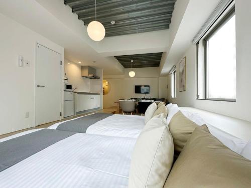 Kuchyň nebo kuchyňský kout v ubytování bHOTEL Arts Dobashi - Beautiful Studio Apt City Center for 6 Ppl
