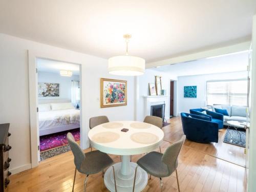 a dining room and living room with a table and chairs at Berkshire Vacation Rental: Stockbridge Home Come Experience The Berkshires in Stockbridge