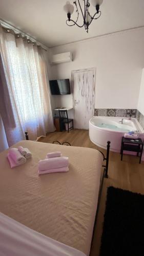 Cama o camas de una habitación en SuiteSicily Rooms Palermo