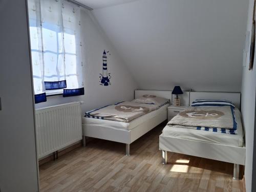 Postel nebo postele na pokoji v ubytování Waterkieker