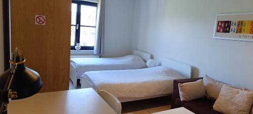 Ein Bett oder Betten in einem Zimmer der Unterkunft 1 2 (Want To) Stay - Furnished business apartments