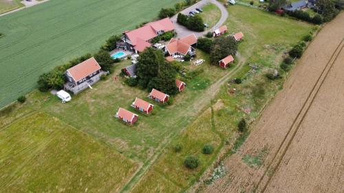 an aerial view of a farm with houses and trees at Gits Gard in Falkenberg
