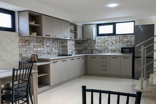 Kuchyň nebo kuchyňský kout v ubytování Hotel K124