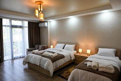 Postel nebo postele na pokoji v ubytování Hotel K124