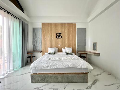 Ένα ή περισσότερα κρεβάτια σε δωμάτιο στο The Estretto Resort
