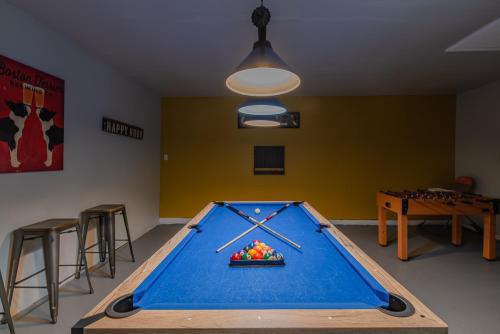 a pool table in a room with a ping pong ball at Superb House by SeaWorld, Private POOL & GameRoom in San Antonio