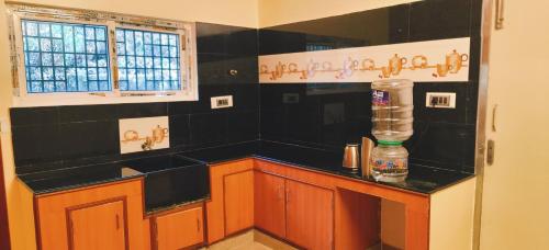 Kuchyň nebo kuchyňský kout v ubytování Black Pepper Cottage Yercaud