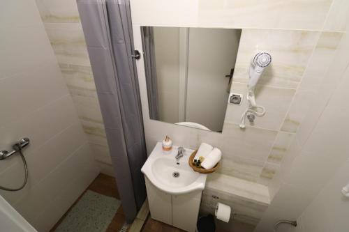 Koupelna v ubytování Skarbek Iława, pokoje i apartamenty