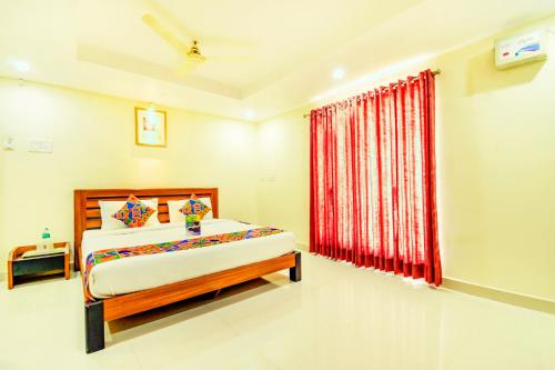 Postel nebo postele na pokoji v ubytování K HOTELS - CHENNAI AIRPORT