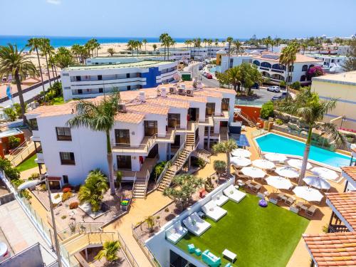 an aerial view of a resort with a swimming pool at Casas Pepe Apartments & Spa- Adults Only in Playa del Ingles