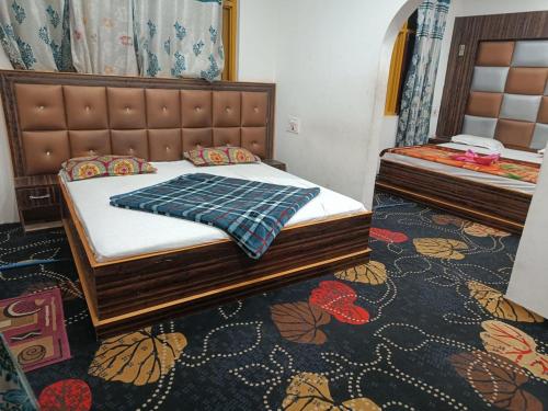 a bedroom with a bed in a room at Valley holidays in Srinagar