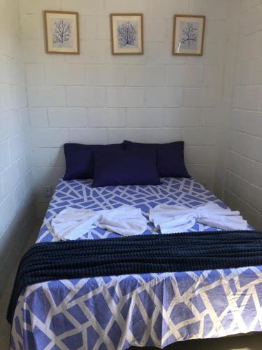 เตียงในห้องที่ Villa Coral azul