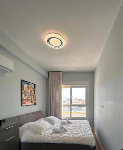 Cama o camas de una habitación en City Haven Tirana